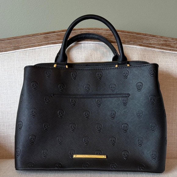 Betsey Johnson Handbags - Betsey Johnson Black Embossed Skull Satchel